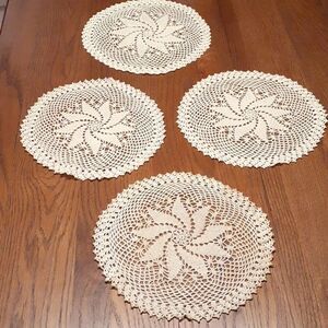 4 pc bundle vtg. Ecru Crocheted pinwheel design 9-10" doilies.